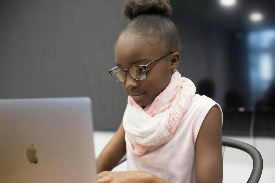A student working on a laptop